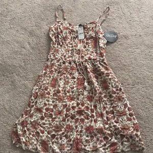 Above the knee beige floral dress never worn!